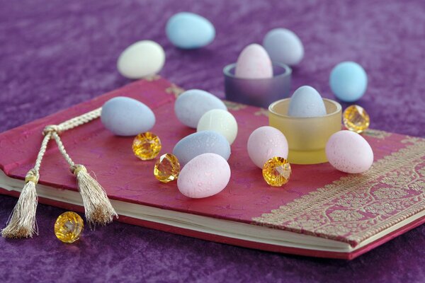 Colored Easter eggs on a notepad