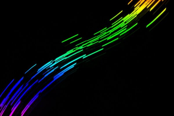 Lignes de flux multicolores sur fond noir