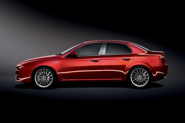 Red alfa romeo on a black background