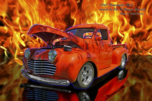 Coche rojo Todd Denton contra el fuego