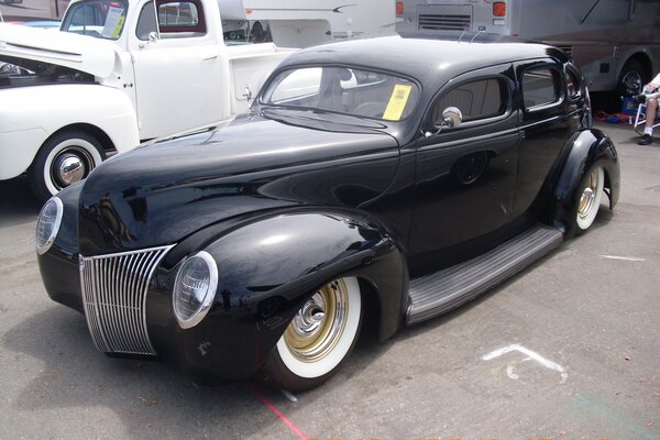 A black car at an automobile show