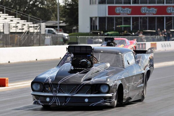 Ford racing car on the track