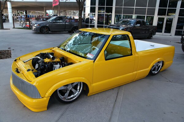 Unusual yellow truck for two passengers