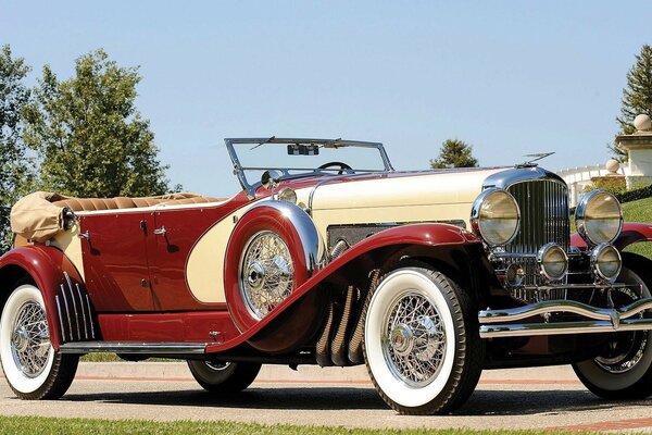 Classic old car. Red and beige