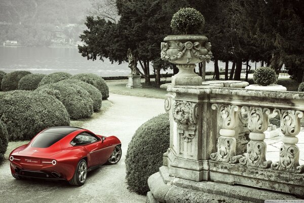 Alfa Romeo at the mansion on the seashore