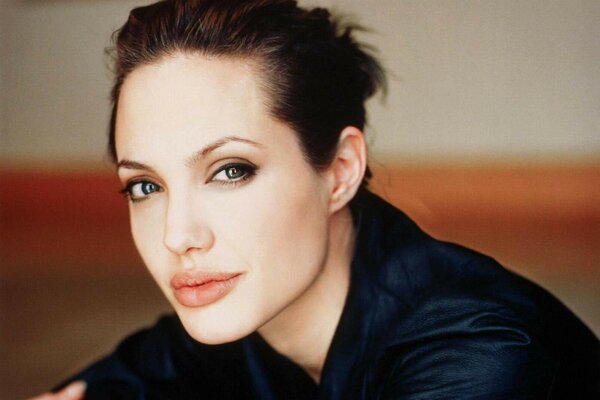 Jolie s piercing gaze and beautiful smile