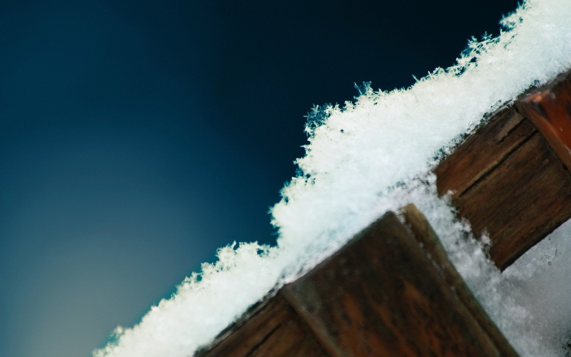 valla de madera copos de nieve azul