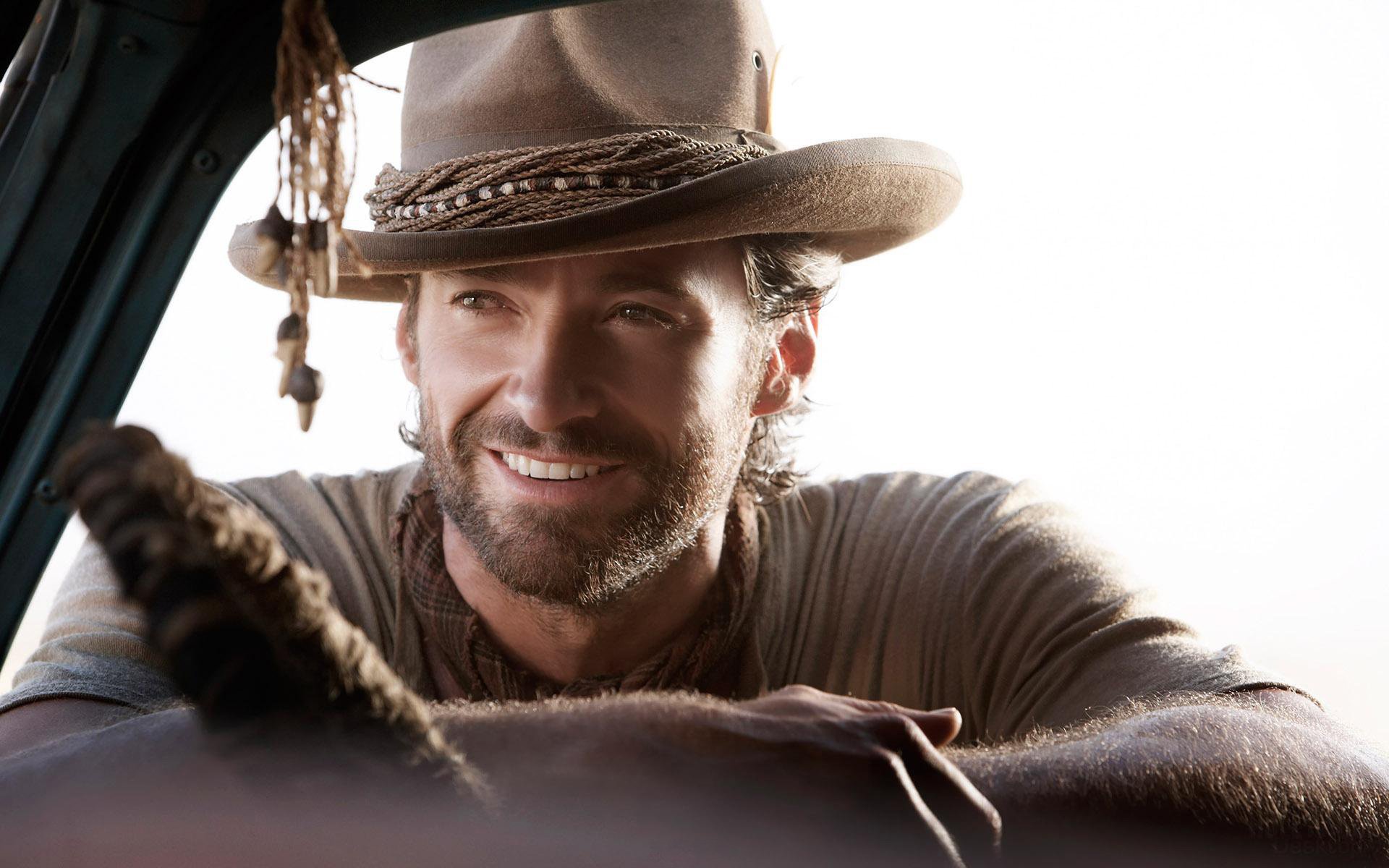 hugh jackman cowboy hat smile portrait actors look handsome unshaven eyes face