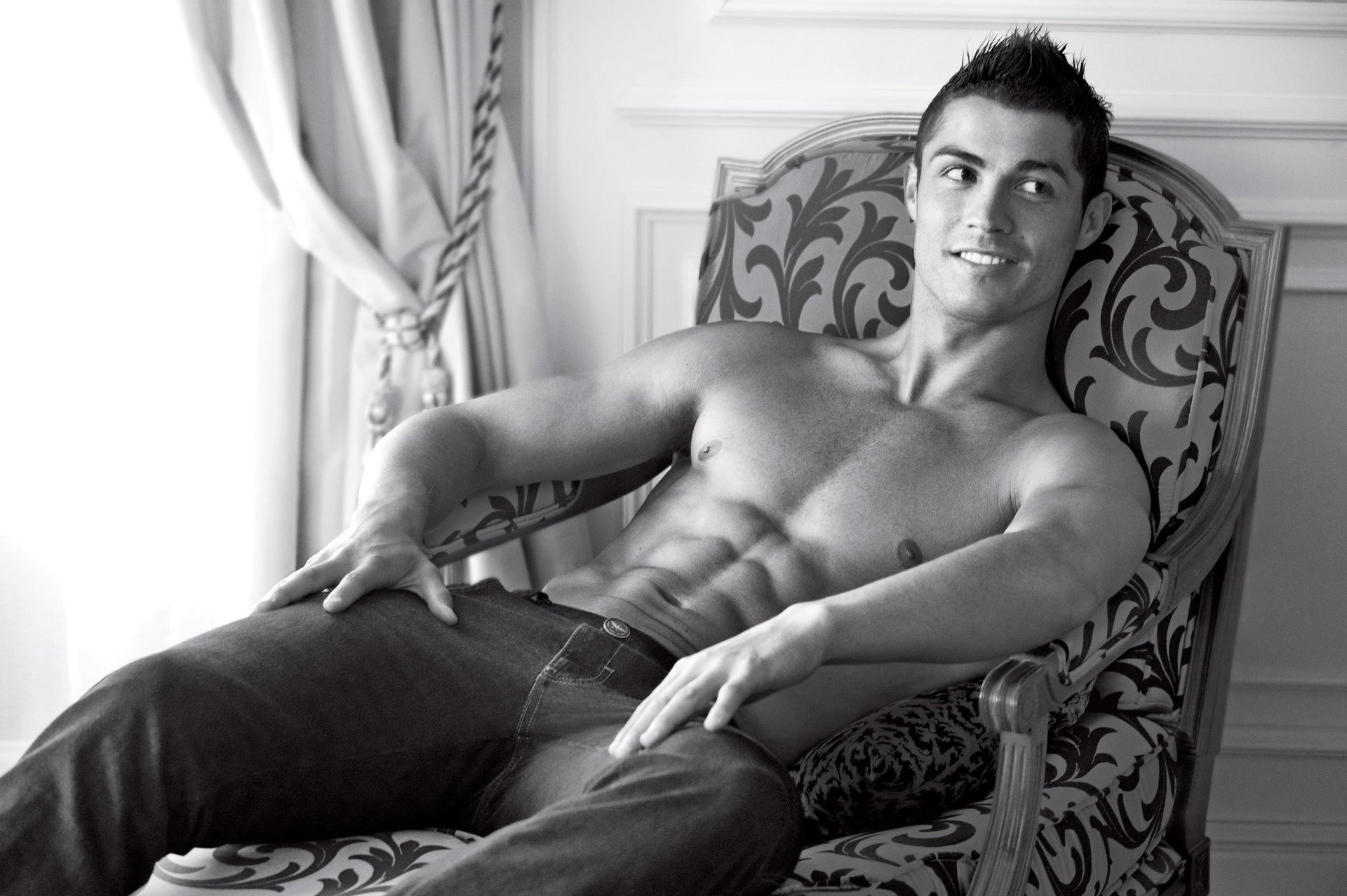 ronaldo carved chair player look b-b handsome cute macho torso muscles body sexy smile looking off to the side jeans room eyes face black and white