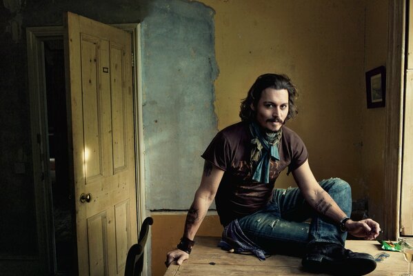 Johnny depp with a cigarette in a ruined room