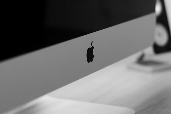 The logo of the imac computer on a black and white background