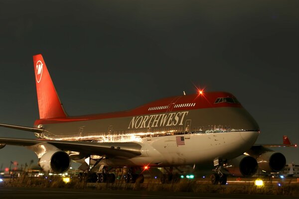 The aircraft of air aviation on the runway at night