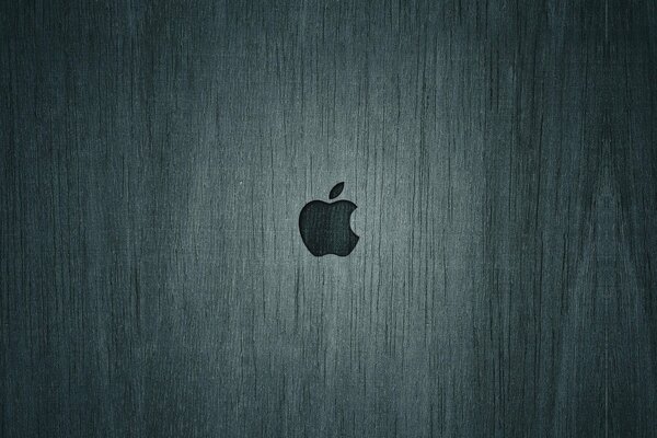 Minimalistic image of the Apple logo under a tree