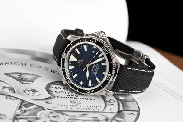 Montres Omega sur la page du livre révélé