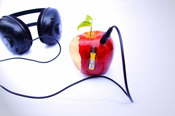 Red Apple in headphones with a battery