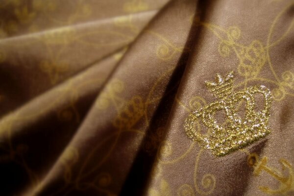 Royal embroidery of the golden logo