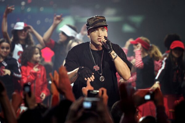 Eminem reads on stage