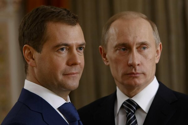 Portrait of two leaders Medvedev and Putin