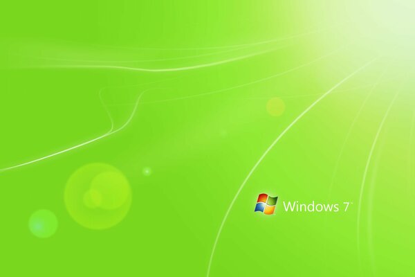 Windows 7 sobre un fondo verde con rayas