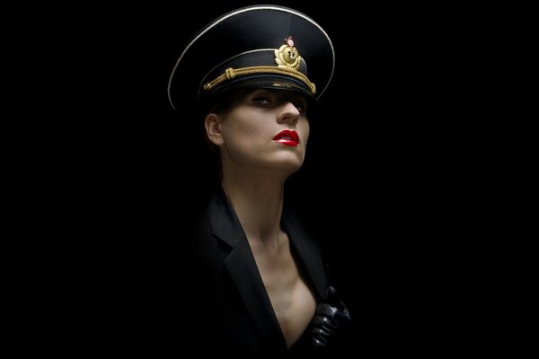 An officer in red lipstick