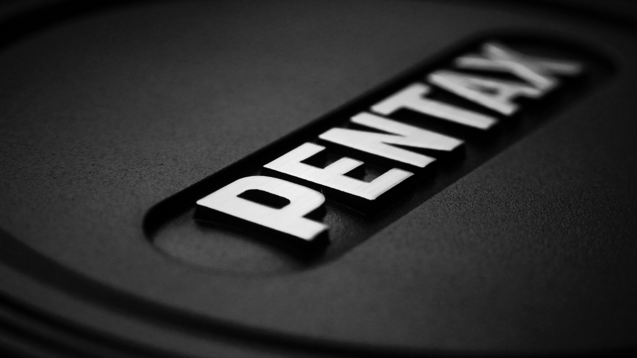 b / n pentax copertura testo parola marca