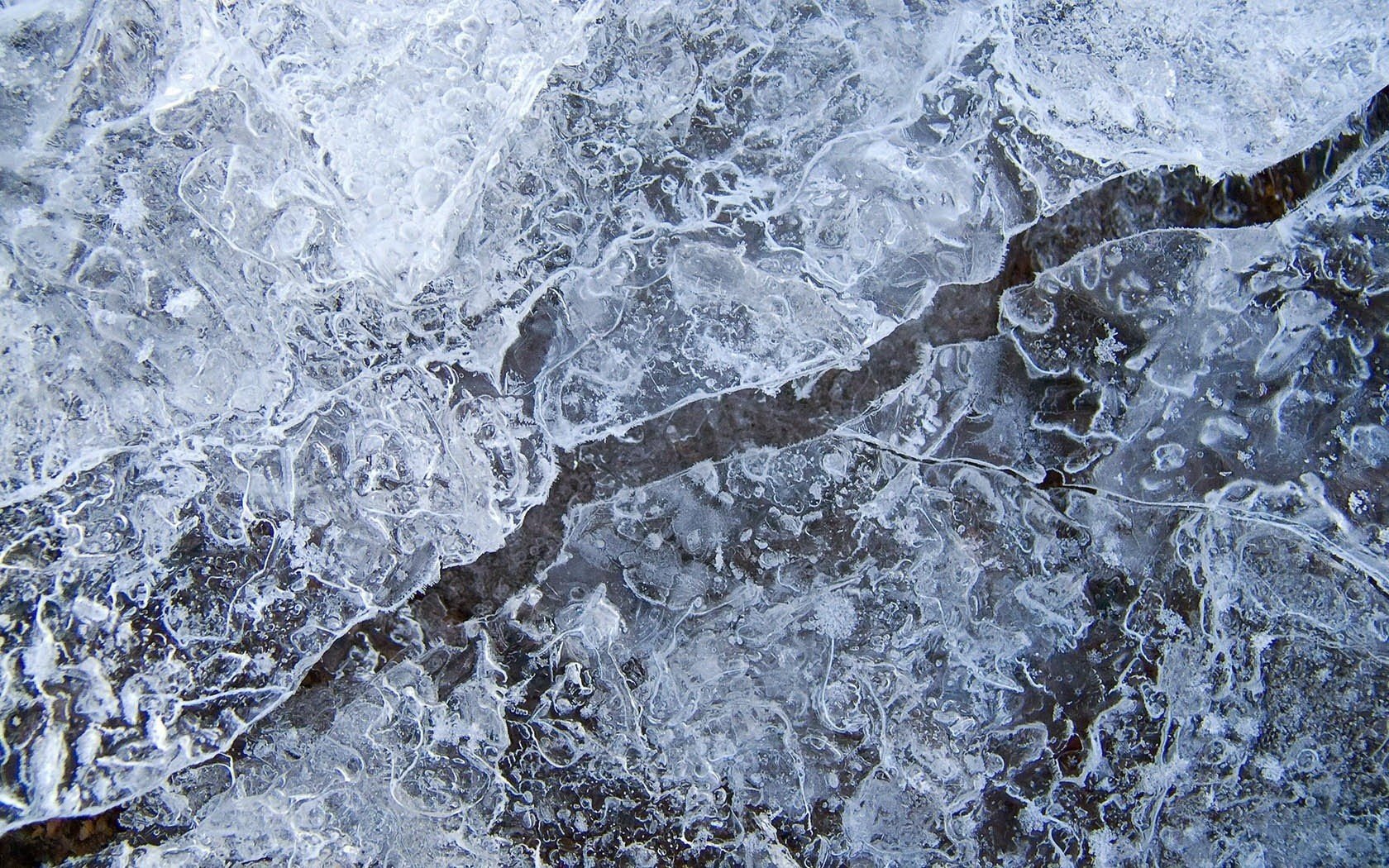 thin ice cracked droplets of water