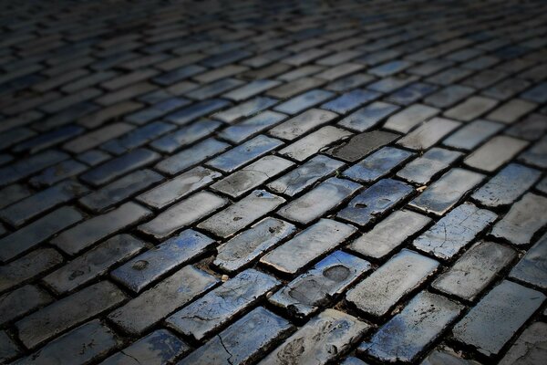 A road made of stone on the ground