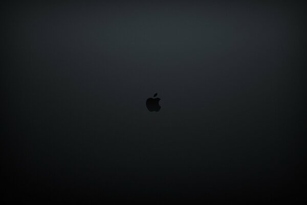 APPLE logo - a bitten apple on a dark background