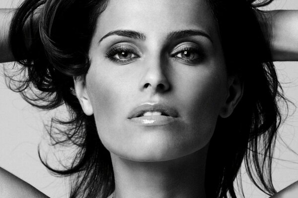 Black and white photo of singer Nelly Furtado s face