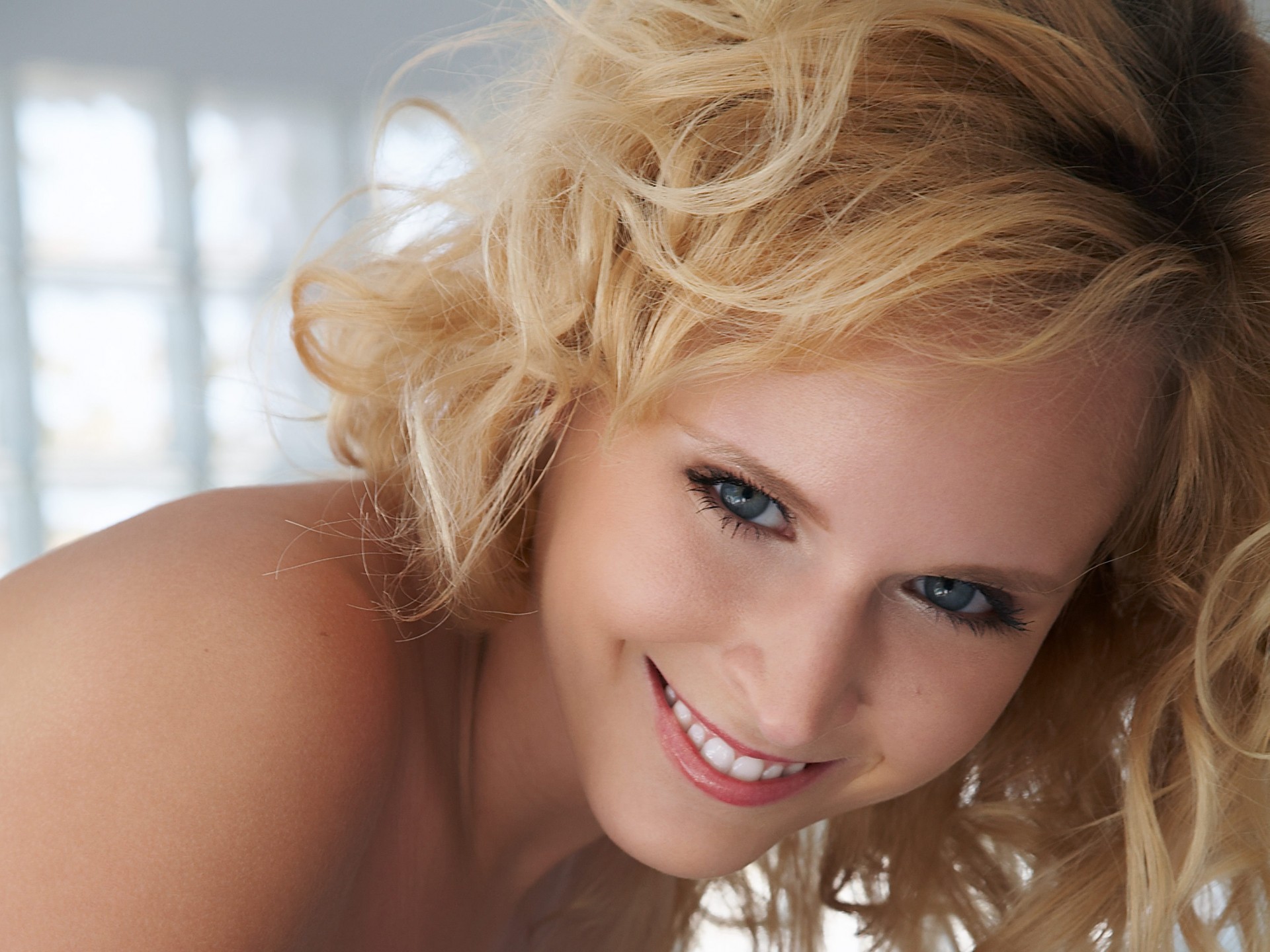 girl blonde hair smile