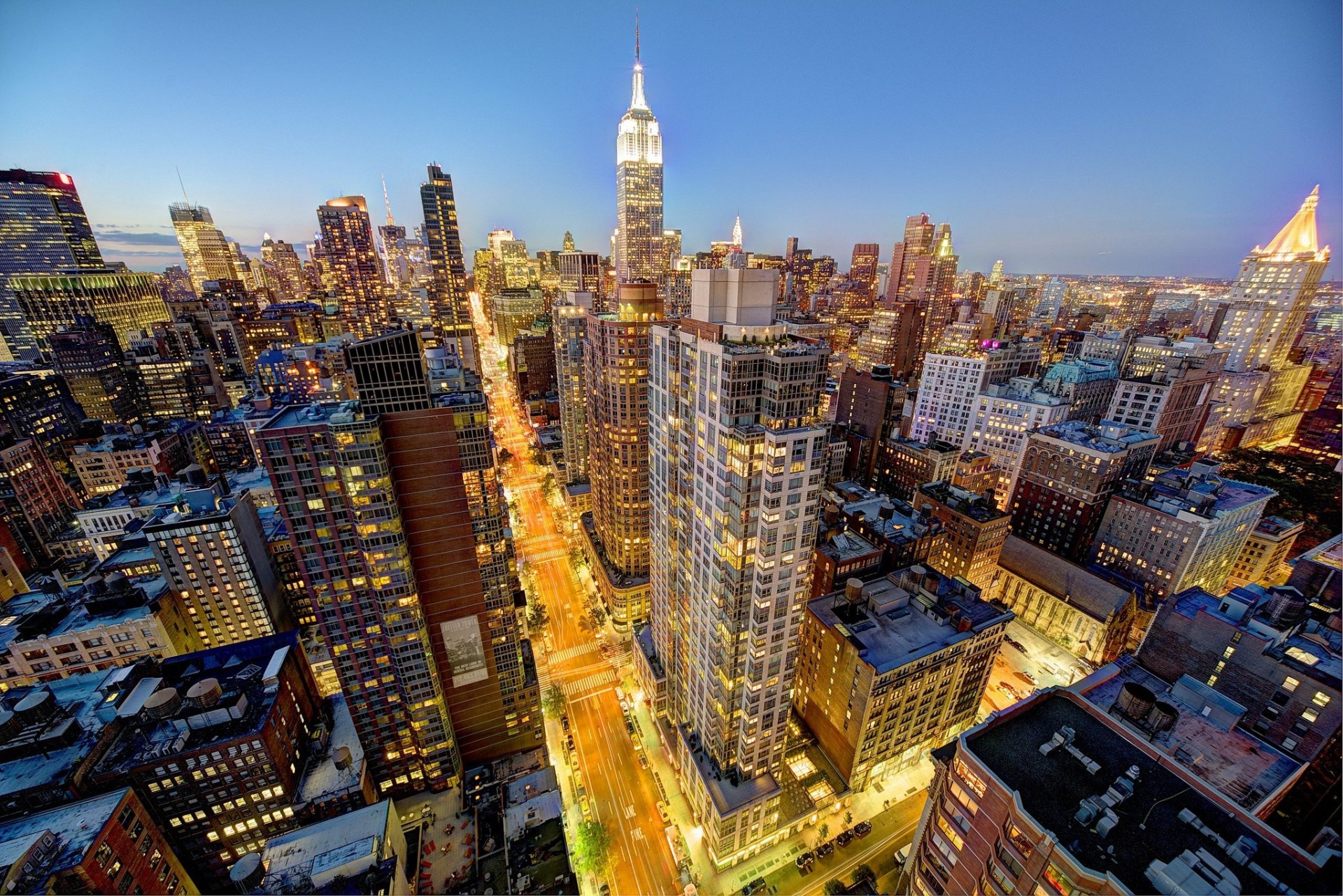 midtown lichter manhattan new york wolkenkratzer gebäude panorama straße nachtstadt