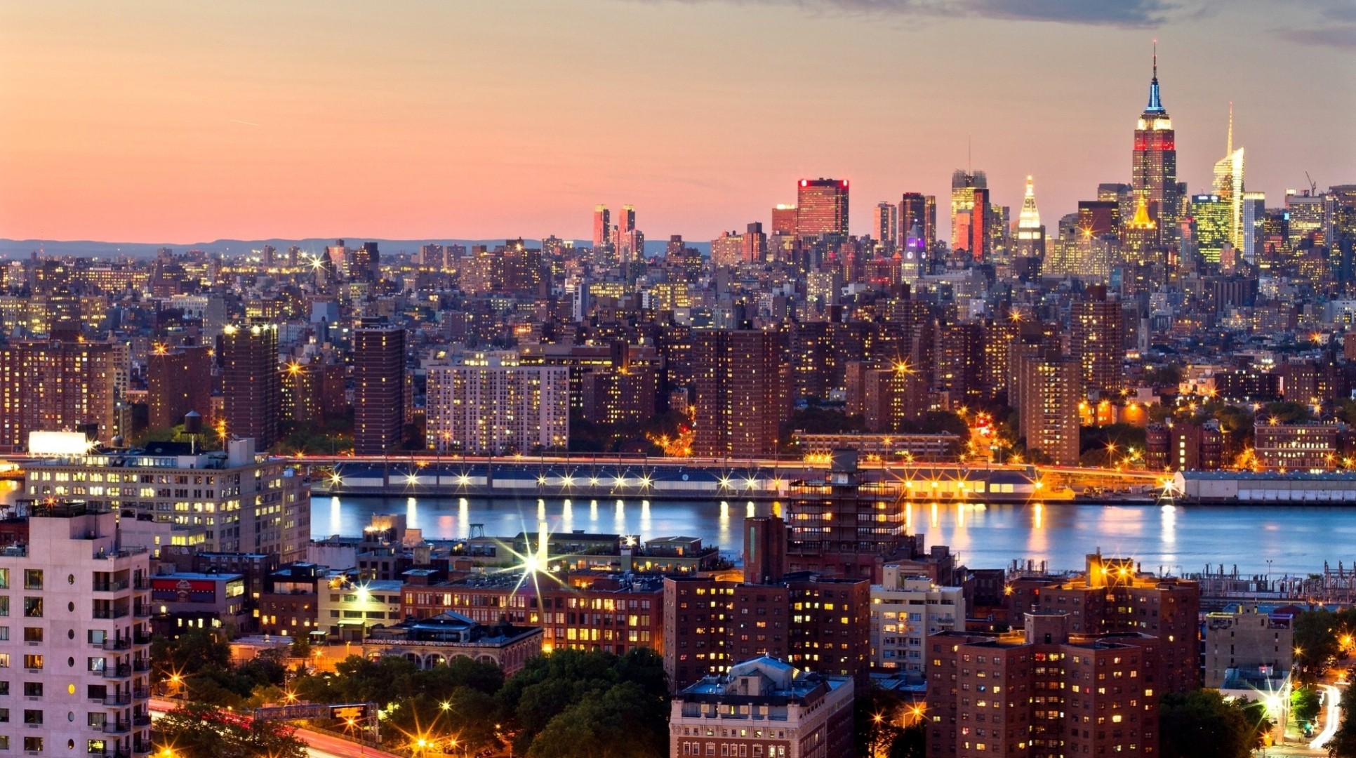 midtown lichter manhattan sonnenuntergang new york usa bäume wolkenkratzer stadt nacht gebäude meerenge hoch