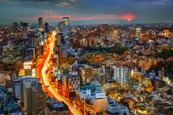 Sunset on the background of Japanese buildings