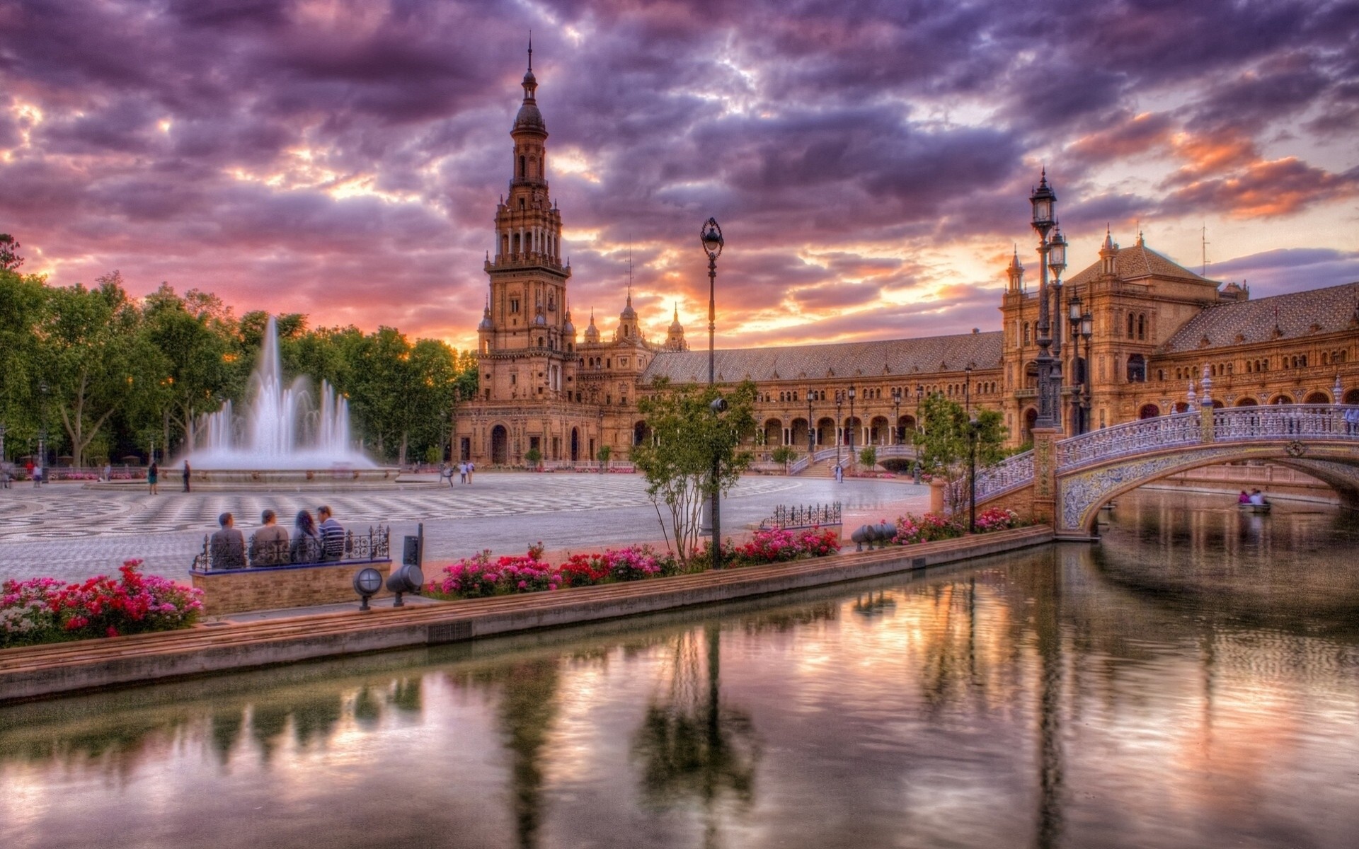 sevilla andalusien fluss brücke lichter brunnen spanien promenade