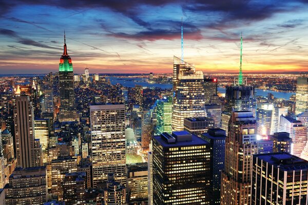 Night New York. Top view of the famous skyscrapers in a sea of lights