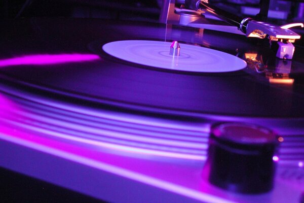 A music player with a purple disc