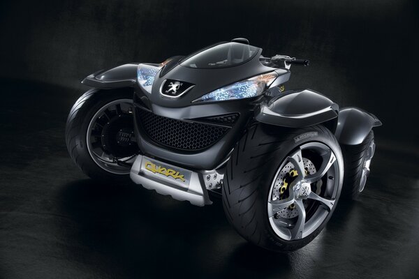 Peugeot quad bike on a dark background