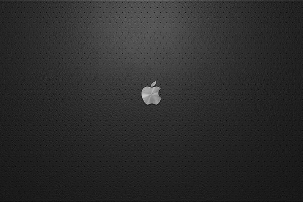 The emblem is a bitten apple with a silver sheen on a black background