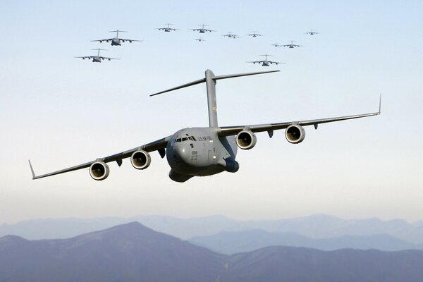 Jet transport planes over the mountains