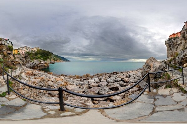 Panorama of Italy with the embankment and rocks