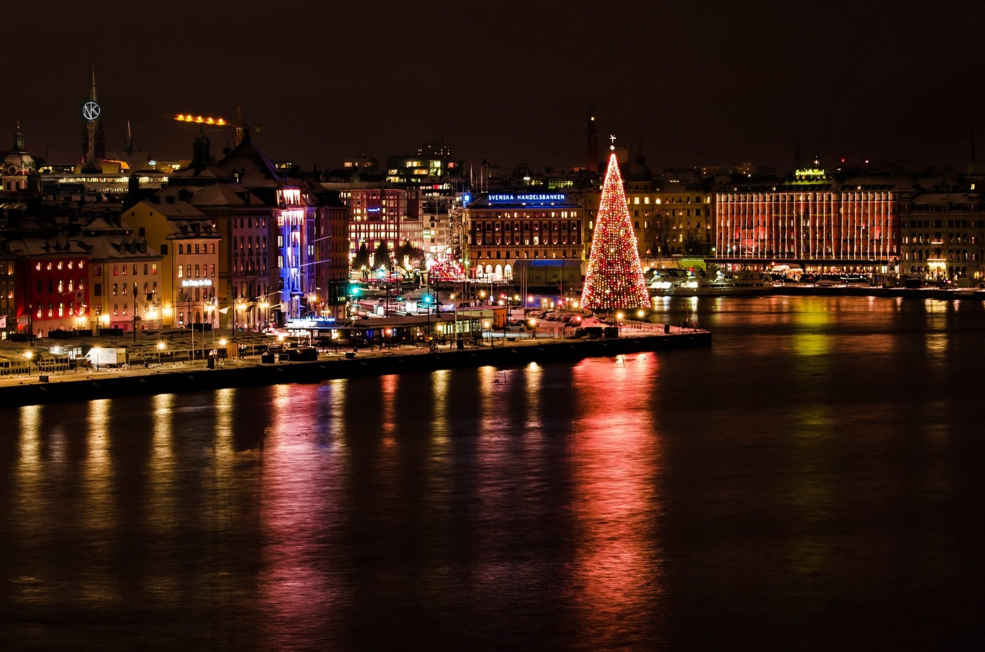 christmas tree lights night sweden town building stockholm christmas holidays house