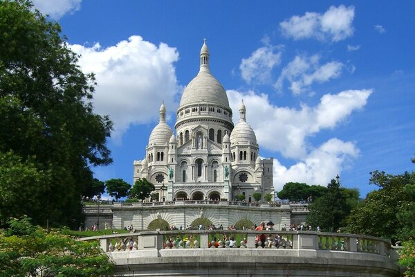 Snow-white domes of the basilica against the blue sky