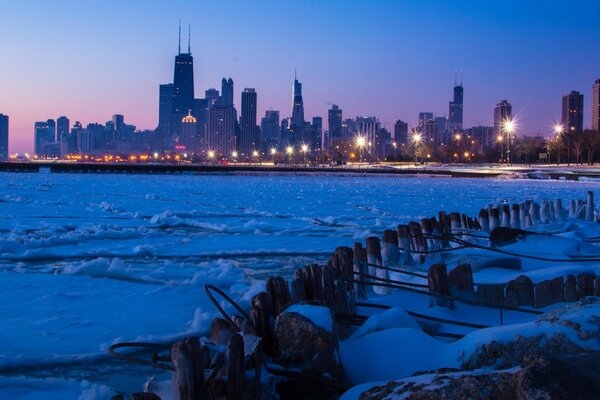 Winter Chicago in the streetlights. View from the water