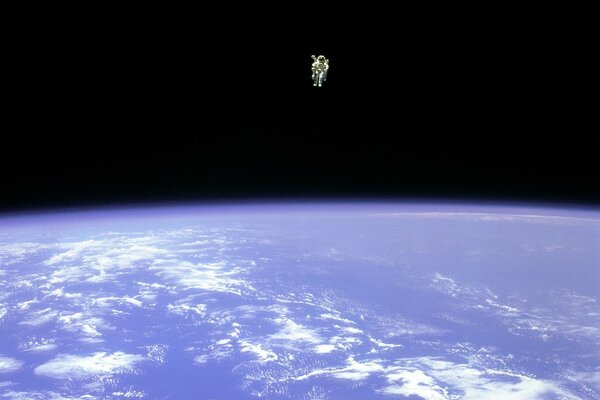 An astronaut on Earth in outer space