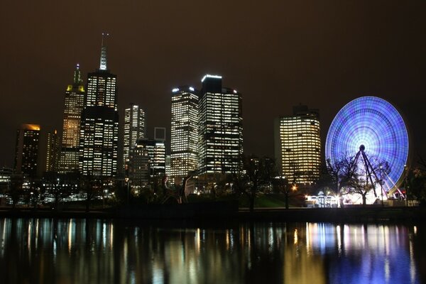 Reflection of the night city in the water