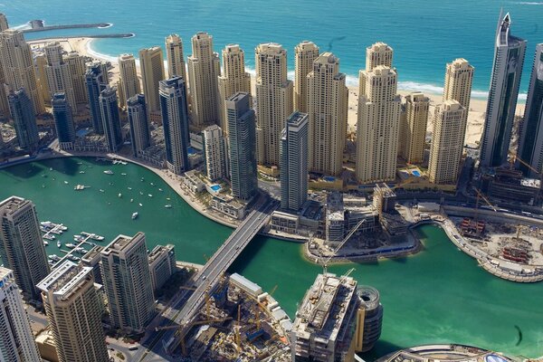 Dubai building on the background of the sea