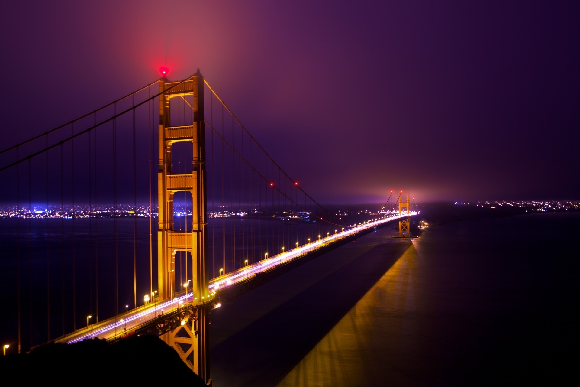 nebbia luce d oro notte ponte cancello lungo oceano