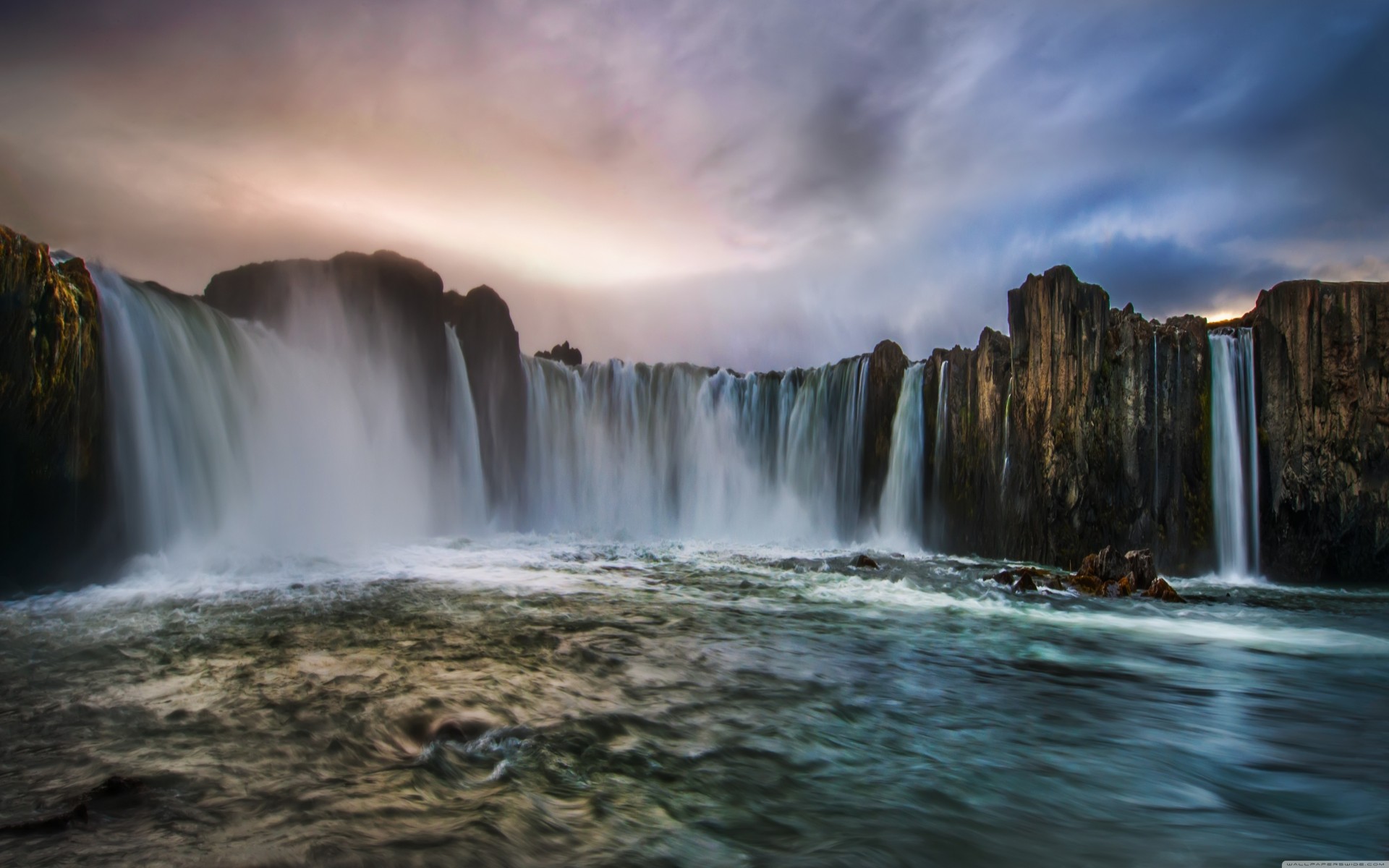 islanda acqua nuvole rocce cascata