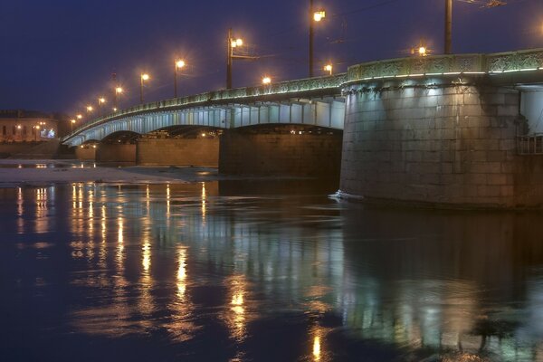 There are beautiful bridges and houses in St. Petersburg