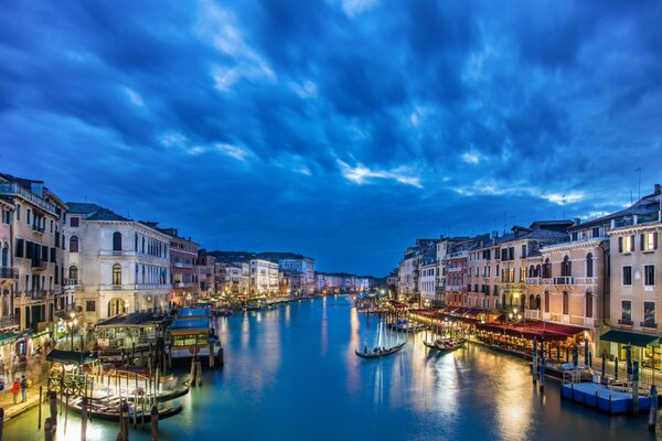 The beautiful night sky of Venice. Lights of the night city